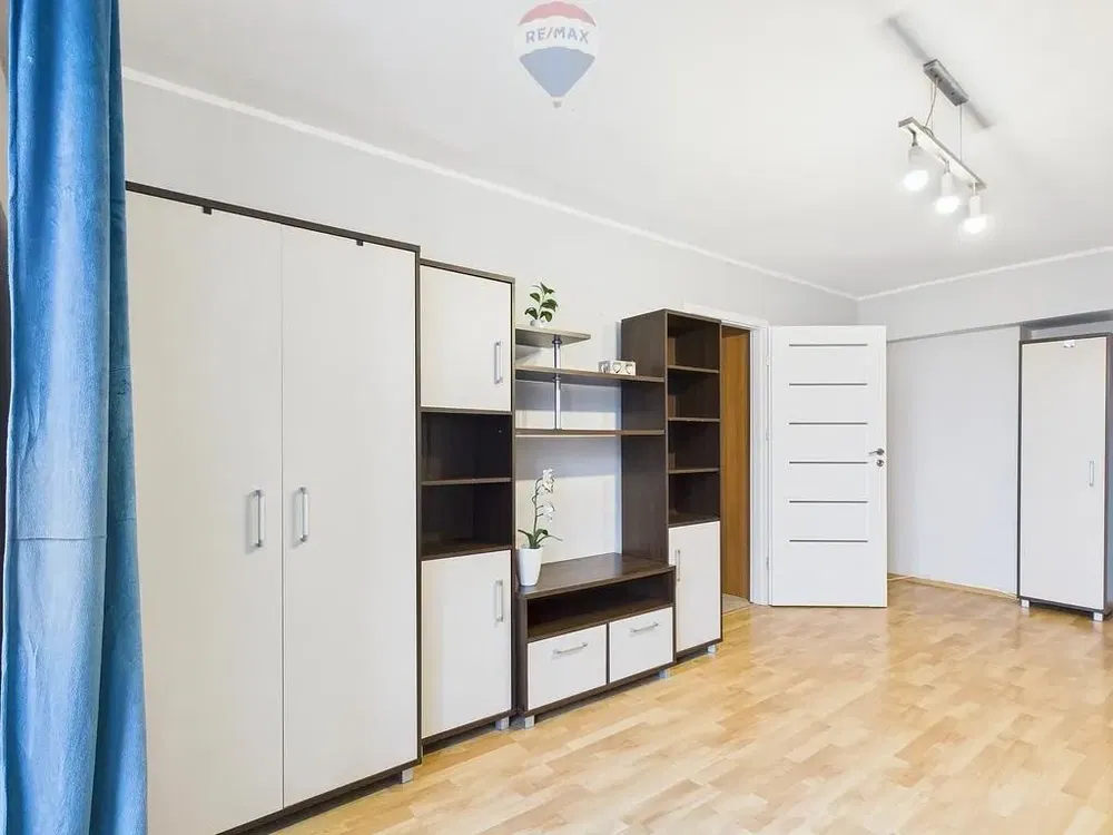 Kitchen; kitchen appliances, wood floor, natural light, modern style, renovated