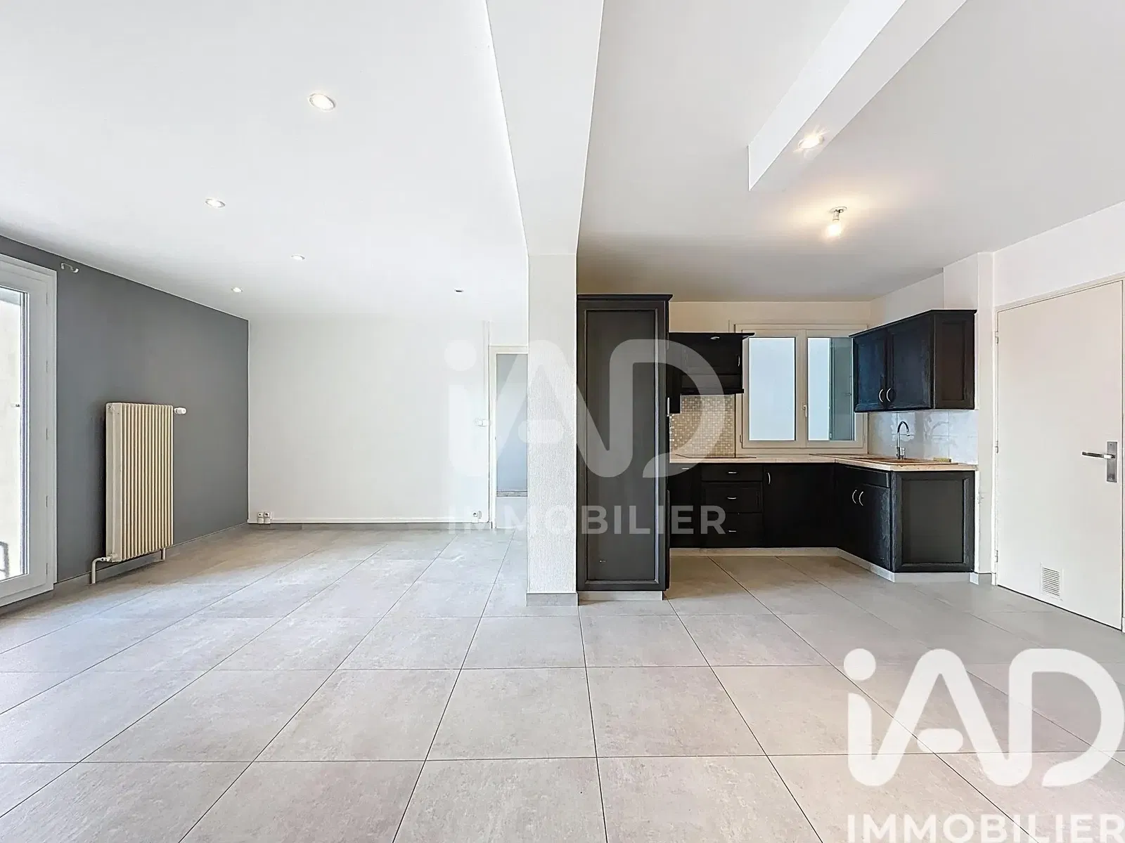 Kitchen; kitchen appliances, wood floor, natural light, modern style, renovated