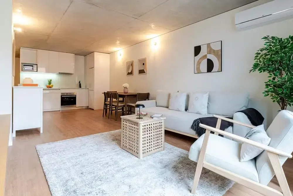 Kitchen; kitchen appliances, wood floor, natural light, modern style, renovated