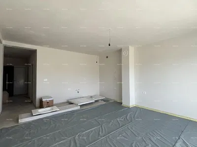 Kitchen; kitchen appliances, wood floor, natural light, modern style, renovated