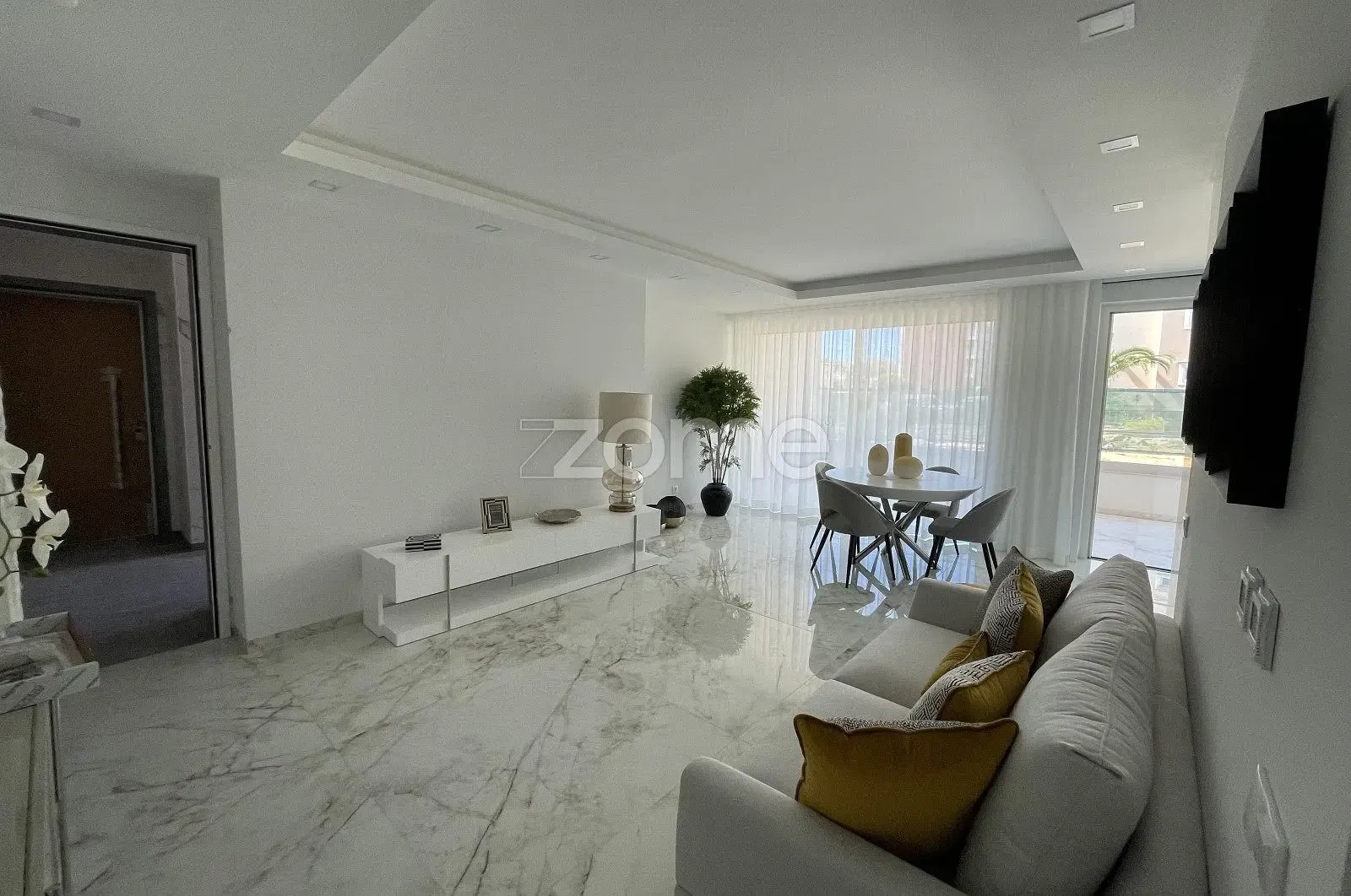 Kitchen; kitchen appliances, wood floor, natural light, modern style, renovated