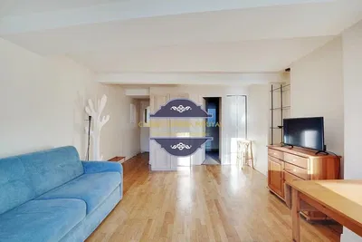 Kitchen; kitchen appliances, wood floor, natural light, modern style, renovated