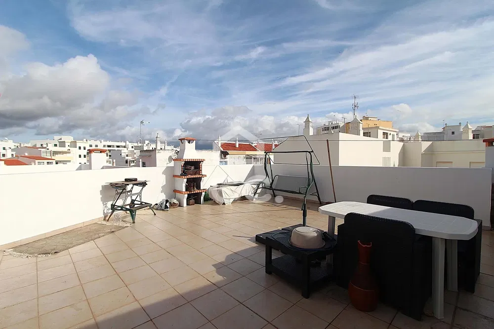 Kitchen; kitchen appliances, wood floor, natural light, modern style, renovated