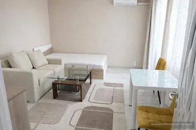 Living room; wood floor, natural light, modern style, high ceiling