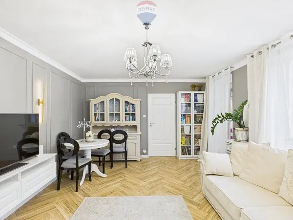 Kitchen; kitchen appliances, wood floor, natural light, modern style, renovated