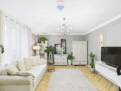 Kitchen; kitchen appliances, wood floor, natural light, modern style, renovated