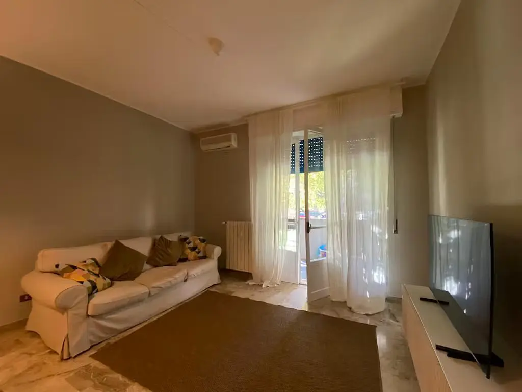 Kitchen; kitchen appliances, wood floor, natural light, modern style, renovated