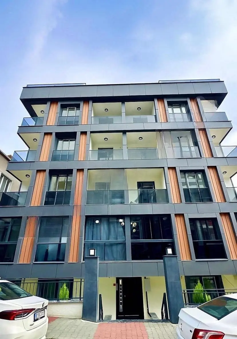 Kitchen; kitchen appliances, wood floor, natural light, modern style, renovated