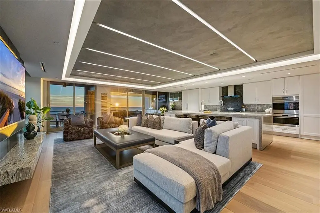 Kitchen; kitchen appliances, wood floor, natural light, modern style, renovated