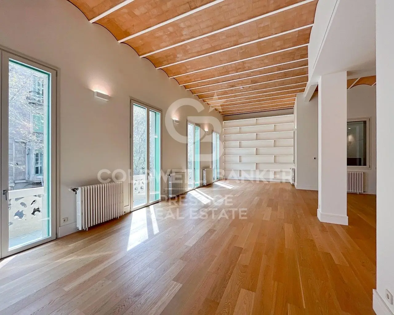Kitchen; kitchen appliances, wood floor, natural light, modern style, renovated