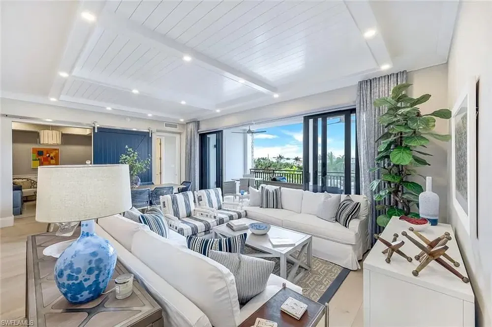 Kitchen; kitchen appliances, wood floor, natural light, modern style, renovated