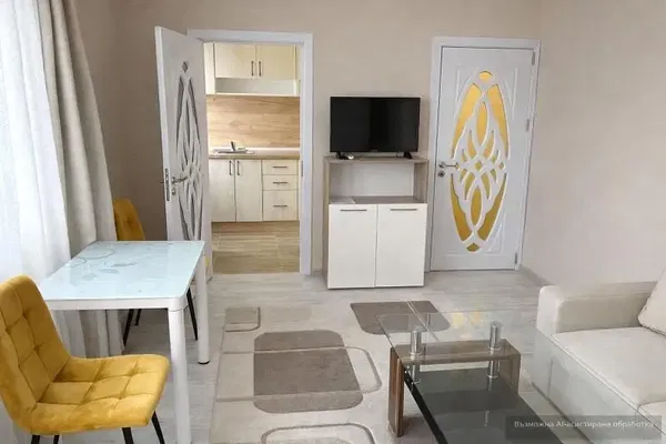 Kitchen; kitchen appliances, wood floor, natural light, modern style, renovated