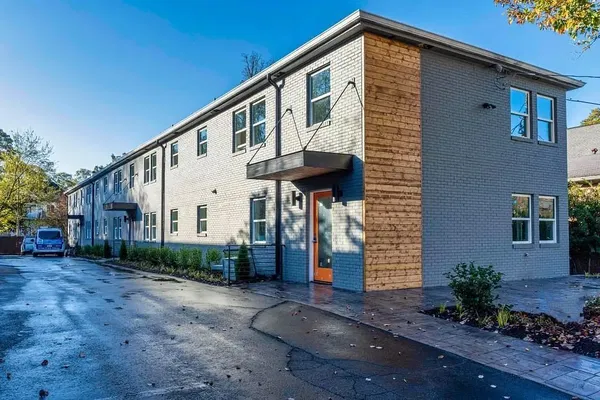 Kitchen; kitchen appliances, wood floor, natural light, modern style, renovated