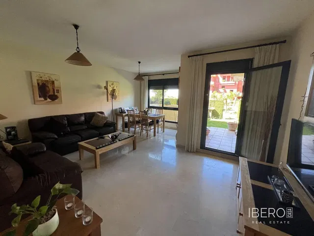 Living room; wood floor, natural light, modern style, high ceiling