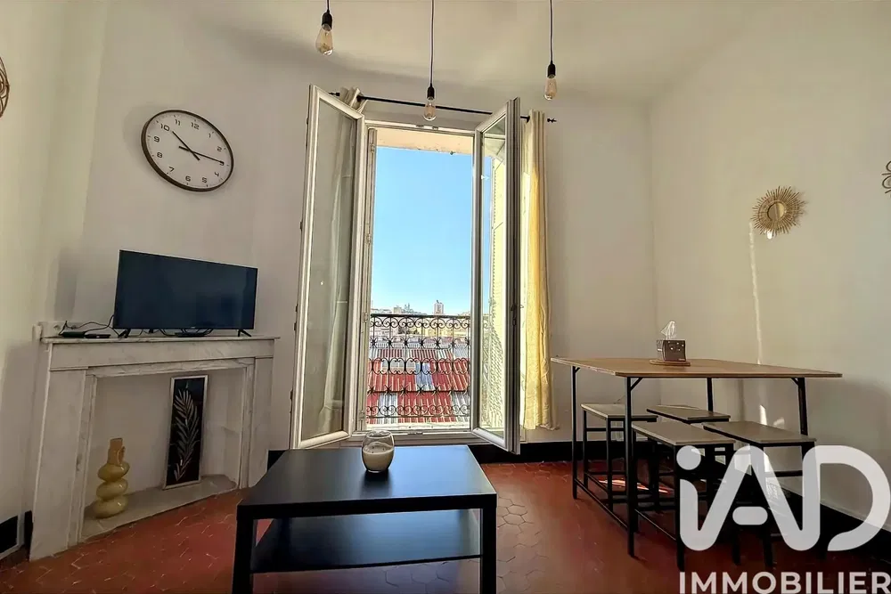 Kitchen; kitchen appliances, wood floor, natural light, modern style, renovated