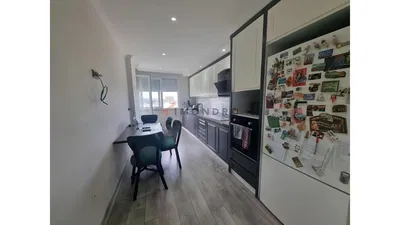 Living room; wood floor, natural light, modern style, high ceiling
