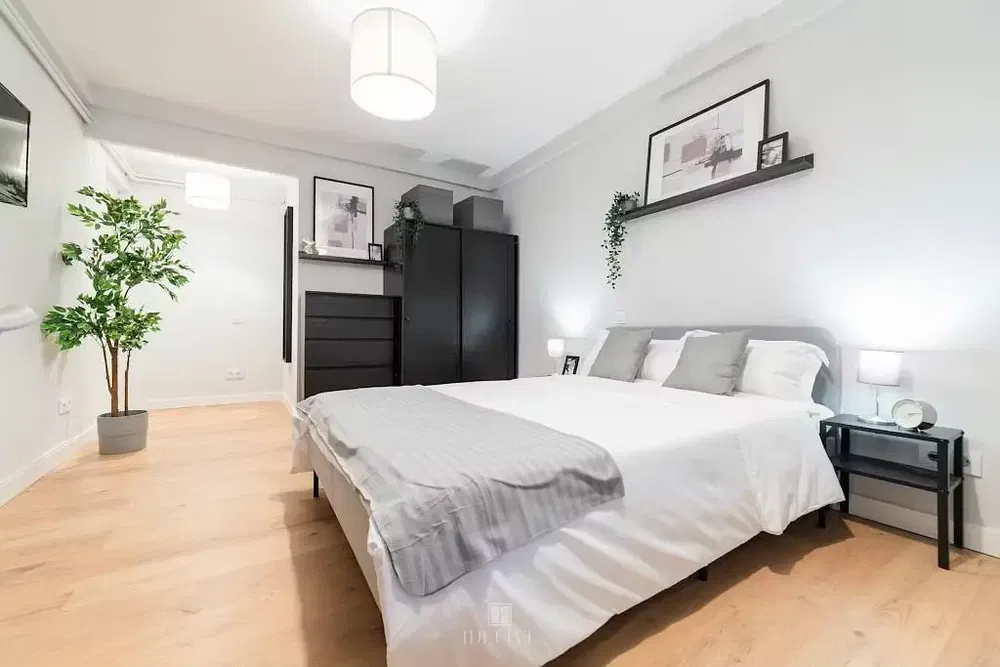 Kitchen; kitchen appliances, wood floor, natural light, modern style, renovated