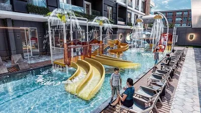 Kitchen; kitchen appliances, wood floor, natural light, modern style, renovated