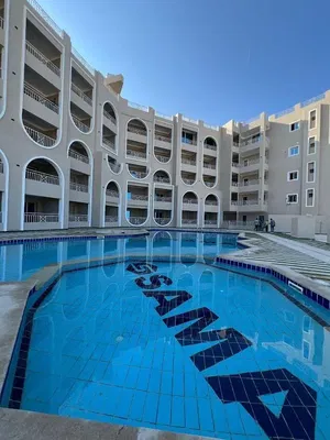 Living room; wood floor, natural light, modern style, high ceiling
