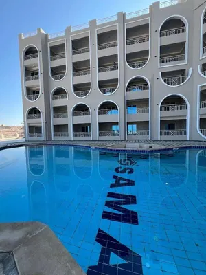 Living room; wood floor, natural light, modern style, high ceiling