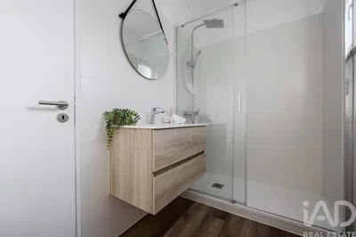 Living room; wood floor, natural light, modern style, high ceiling