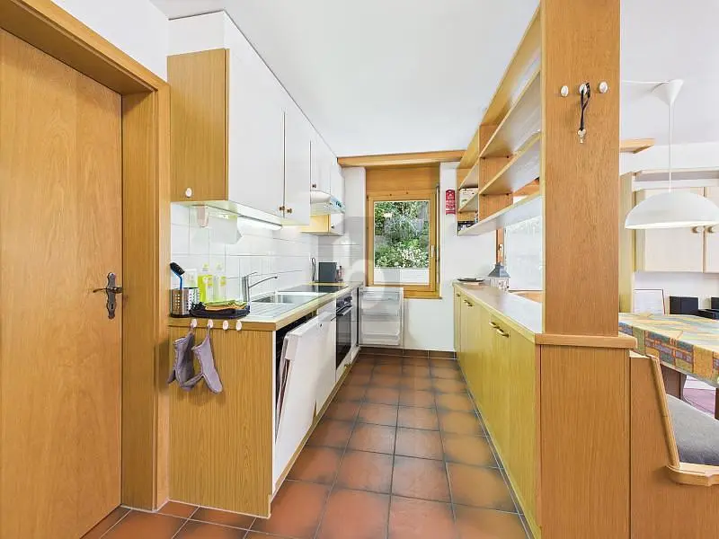 Kitchen; kitchen appliances, wood floor, natural light, modern style
