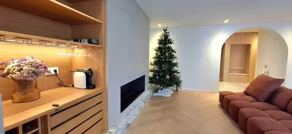 Kitchen; kitchen appliances, wood floor, natural light, modern style, renovated