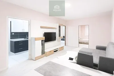 Sala de estar; chão de madeira, luz natural, estilo moderno, teto alto