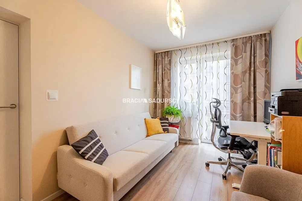 Kitchen; kitchen appliances, wood floor, natural light, modern style, renovated