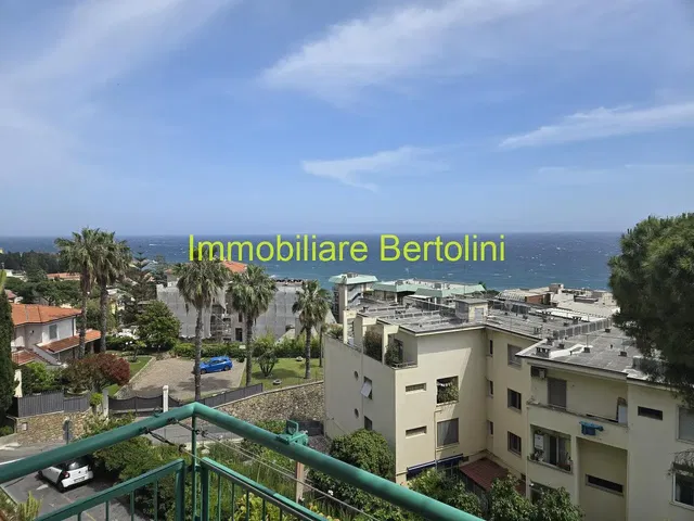 Living room; wood floor, natural light, modern style, high ceiling
