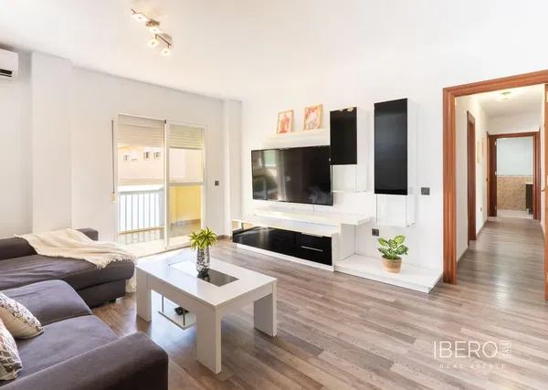 Living room; natural light, wood floor, modern style, high ceiling