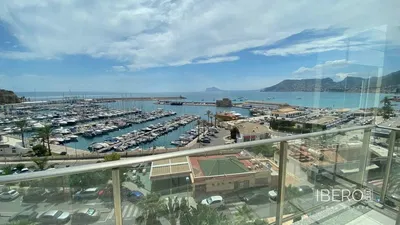Living room; wood floor, natural light, modern style, high ceiling