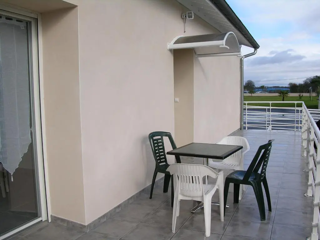 Kitchen; kitchen appliances, wood floor, natural light, modern style, renovated