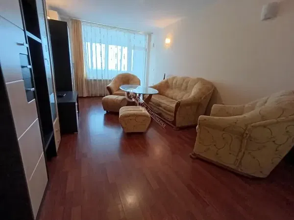 Kitchen; kitchen appliances, wood floor, natural light, modern style, renovated