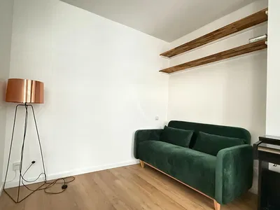 Kitchen; kitchen appliances, wood floor, natural light, modern style, renovated