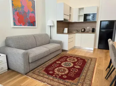 Living room; wood floor, natural light, modern style, high ceiling