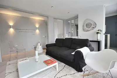 Kitchen; kitchen appliances, wood floor, natural light, modern style, renovated