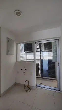 Kitchen; kitchen appliances, wood floor, natural light, modern style, renovated