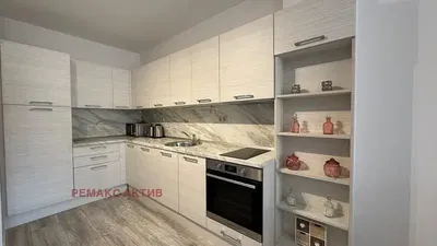 Kitchen; kitchen appliances, wood floor, natural light, modern style, renovated