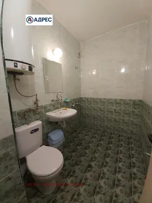 Kitchen; kitchen appliances, wood floor, natural light, modern style, renovated