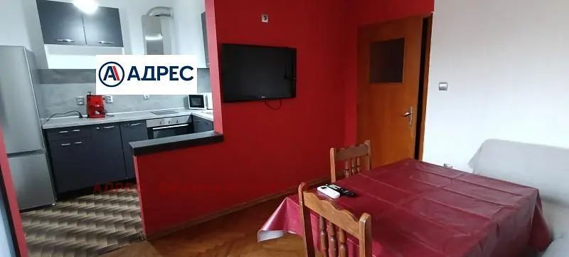 Kitchen; kitchen appliances, wood floor, natural light, modern style, renovated