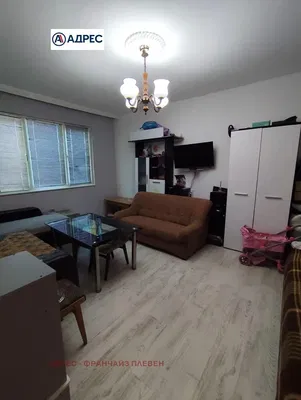 Wohnzimmer; holzboden, tageslicht, moderner stil, hohe decken