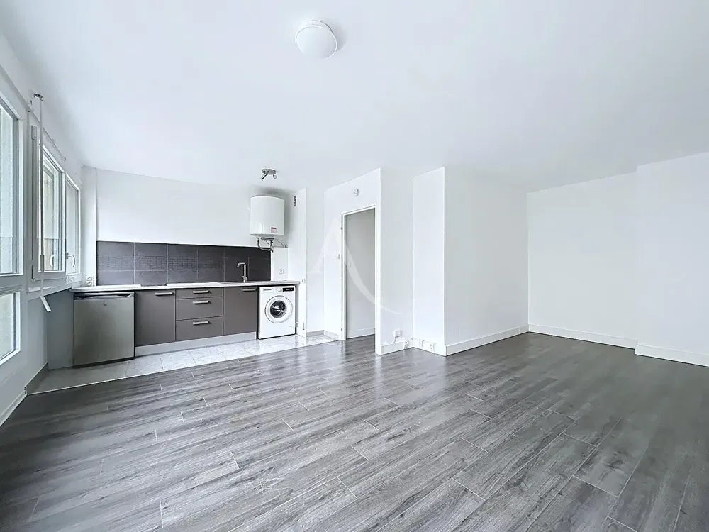 Kitchen; kitchen appliances, wood floor, natural light, modern style, renovated