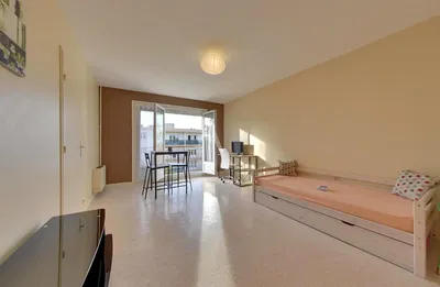 Kitchen; kitchen appliances, wood floor, natural light, modern style, renovated