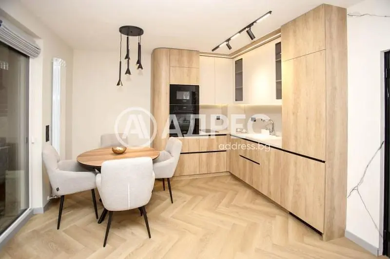 Kitchen; kitchen appliances, wood floor, natural light, modern style, renovated