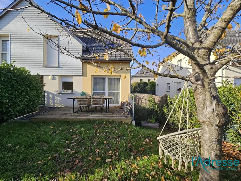 Kitchen; kitchen appliances, wood floor, natural light, modern style, renovated