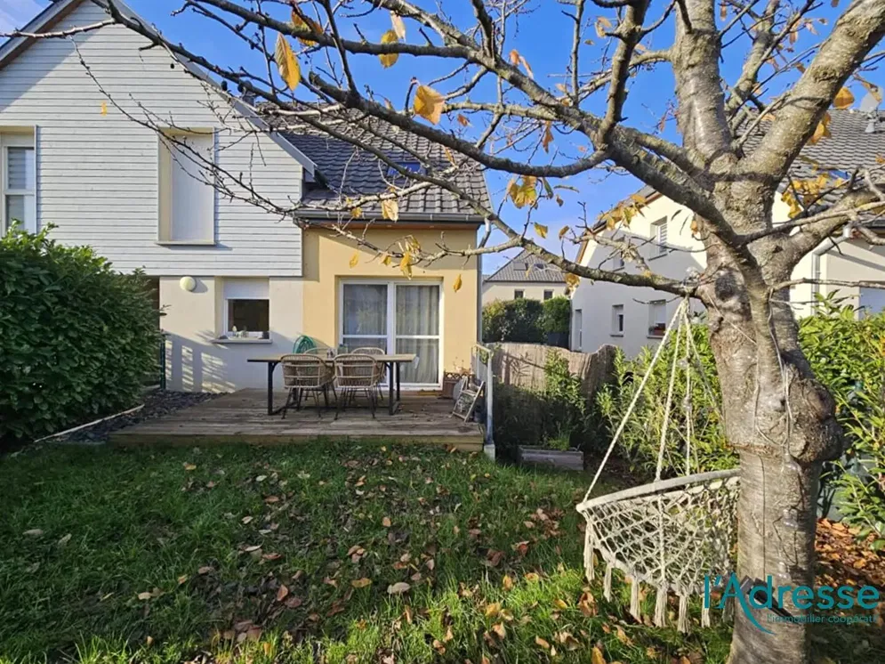 Kitchen; kitchen appliances, wood floor, natural light, modern style, renovated