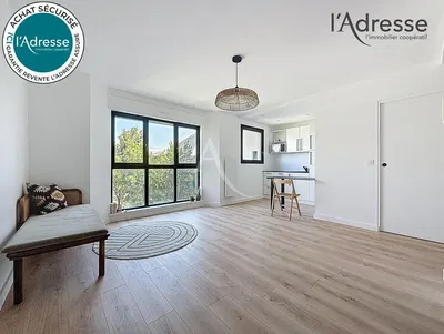 Kitchen; kitchen appliances, wood floor, natural light, modern style, renovated