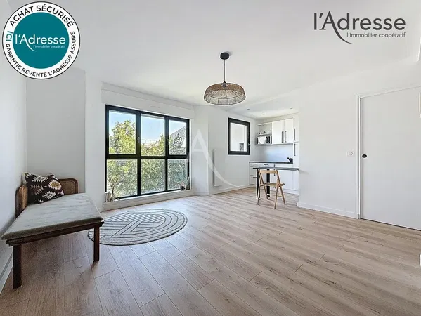 Kitchen; kitchen appliances, wood floor, natural light, modern style, renovated