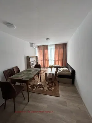Living room; wood floor, natural light, modern style, high ceiling
